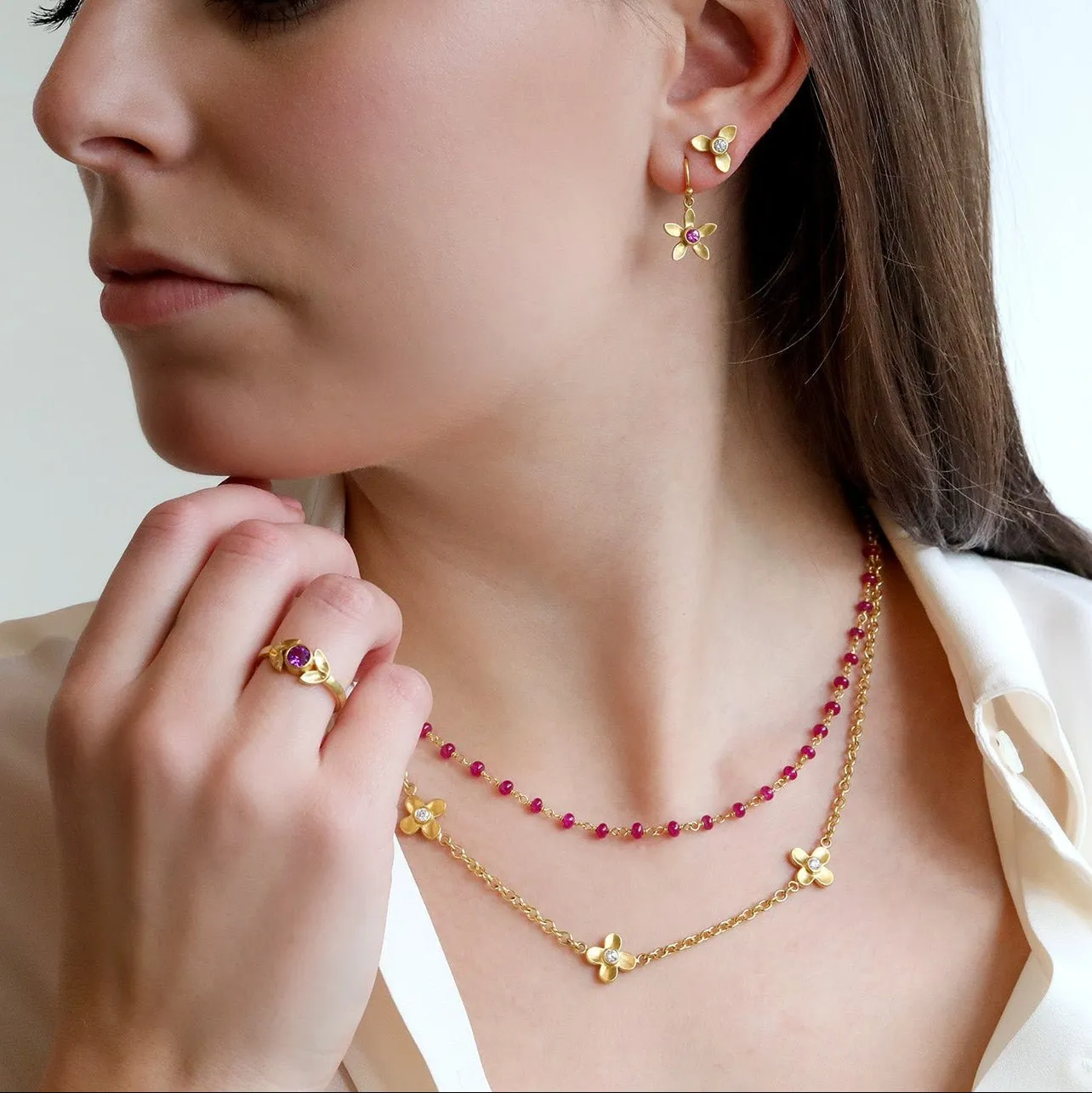 20K Gold Triple Flower Necklace with Diamond Detail