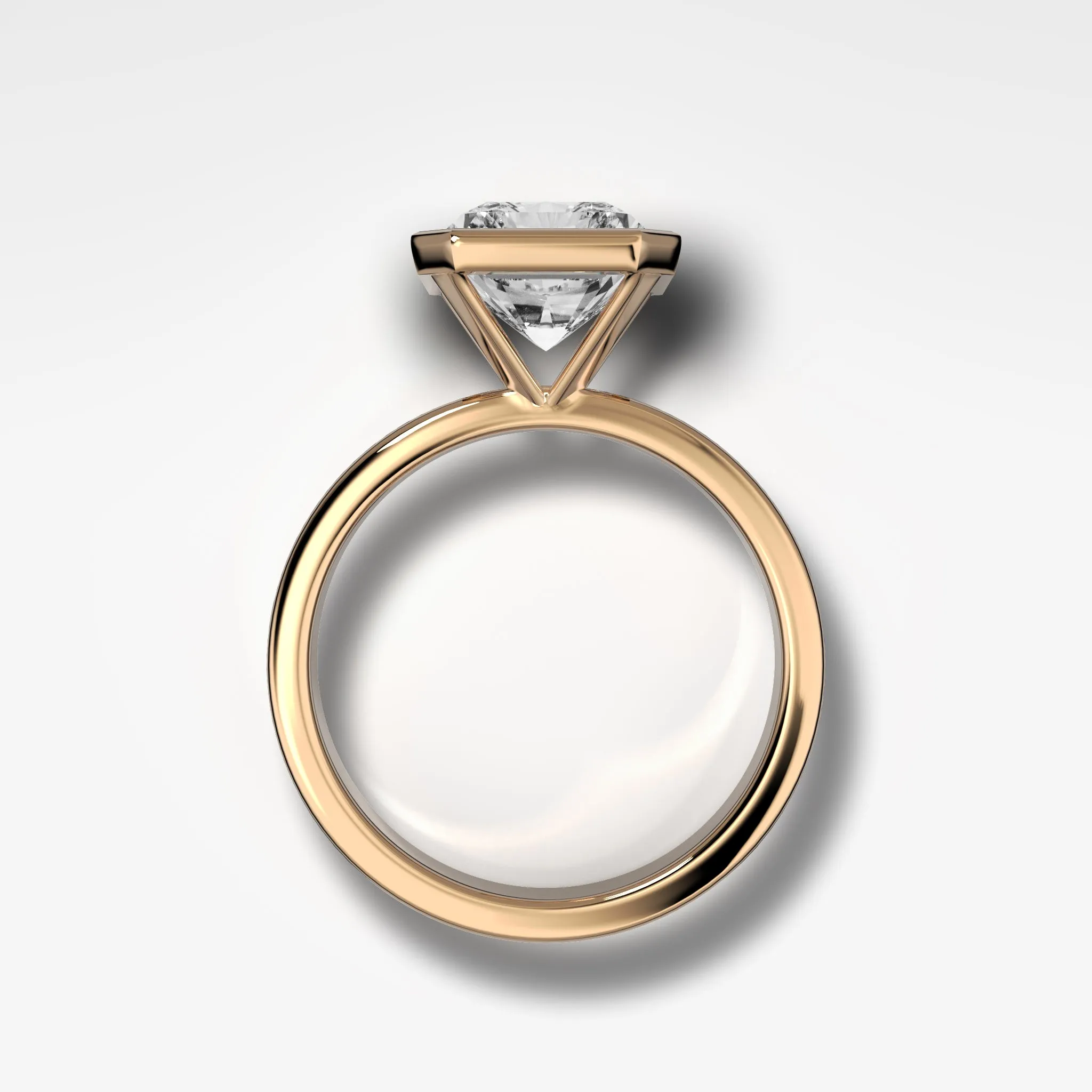Finest Bezel Set Engagement Ring With Elongated Radiant Cut Diamond