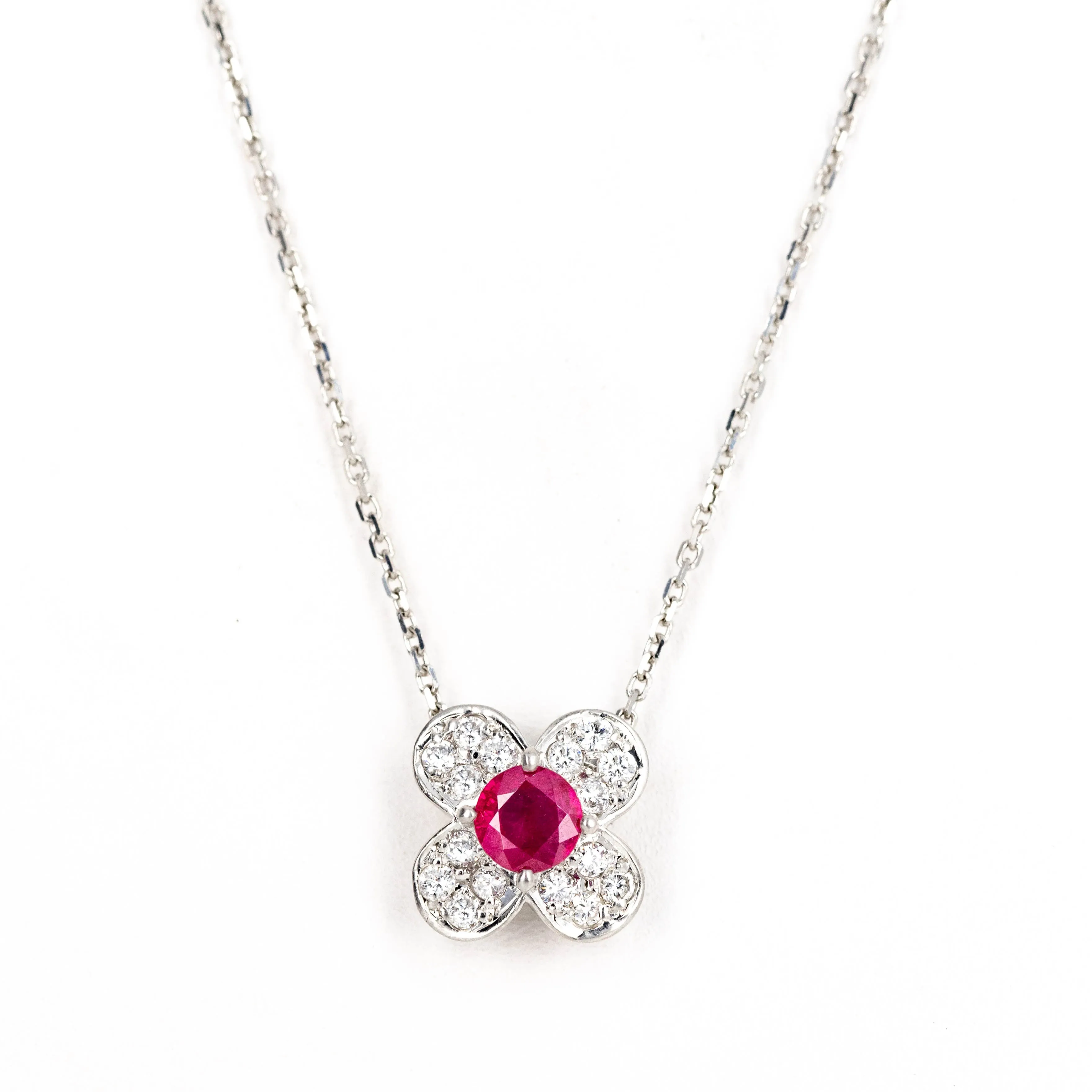 Platinum 0.33 Round Ruby Diamond Floral Clover Pendant Necklace