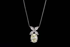 Platinum 1.33 Carat Oval Cut Light Yellow Diamond Pendant Necklace