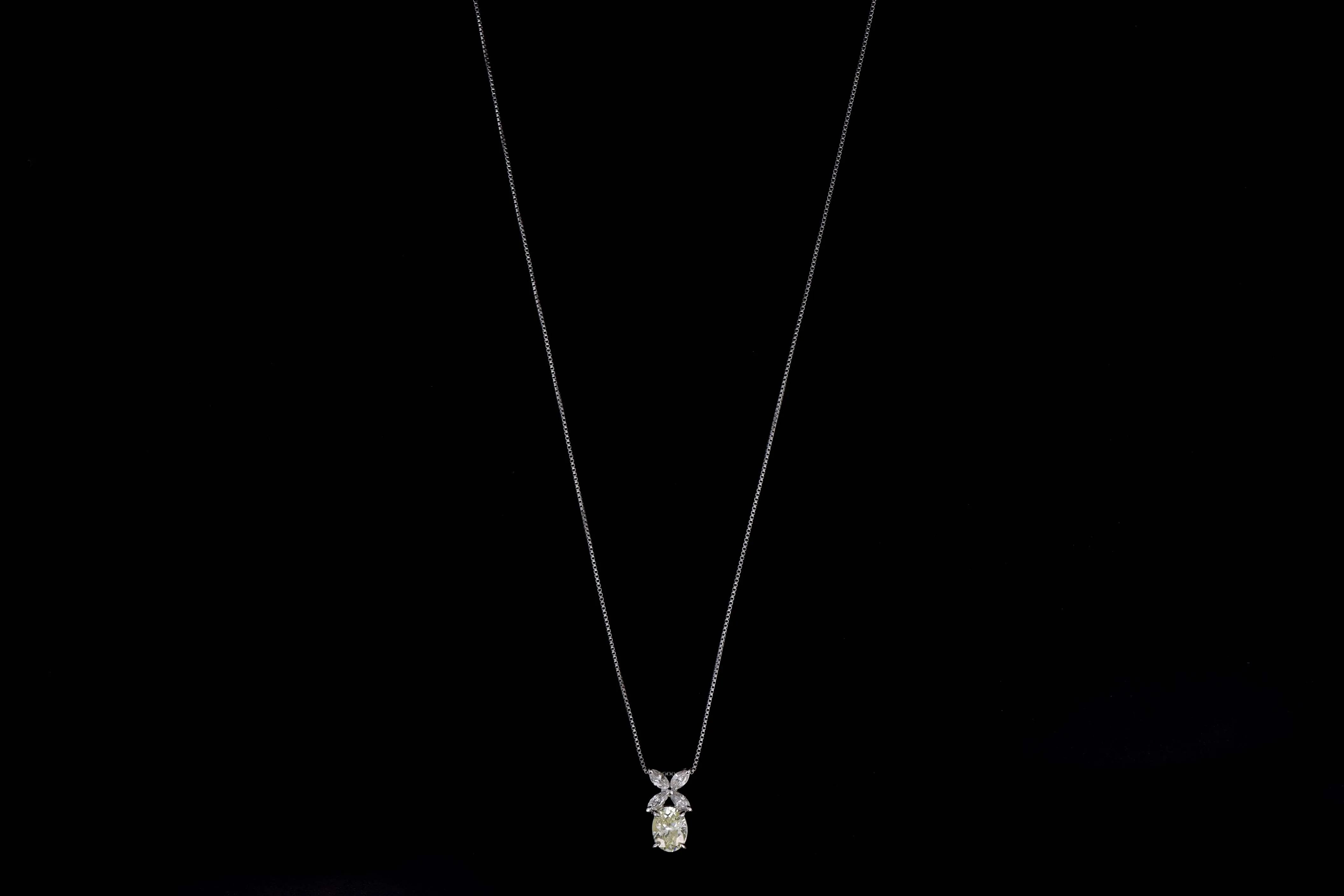 Platinum 1.33 Carat Oval Cut Light Yellow Diamond Pendant Necklace