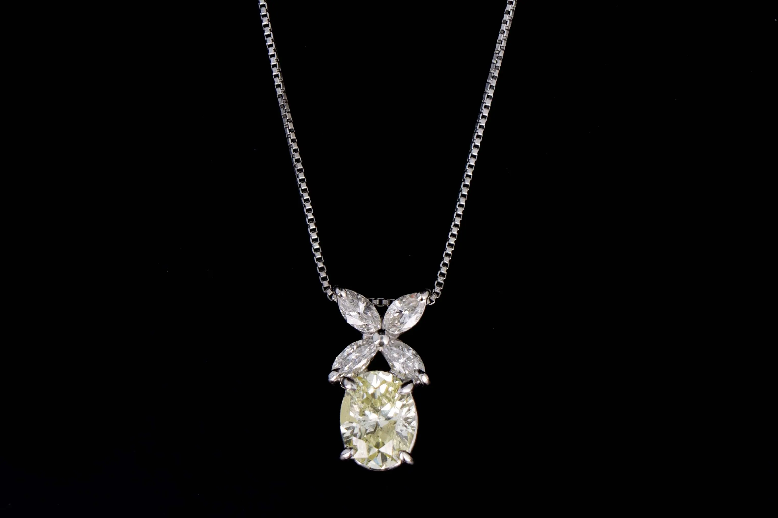Platinum 1.33 Carat Oval Cut Light Yellow Diamond Pendant Necklace