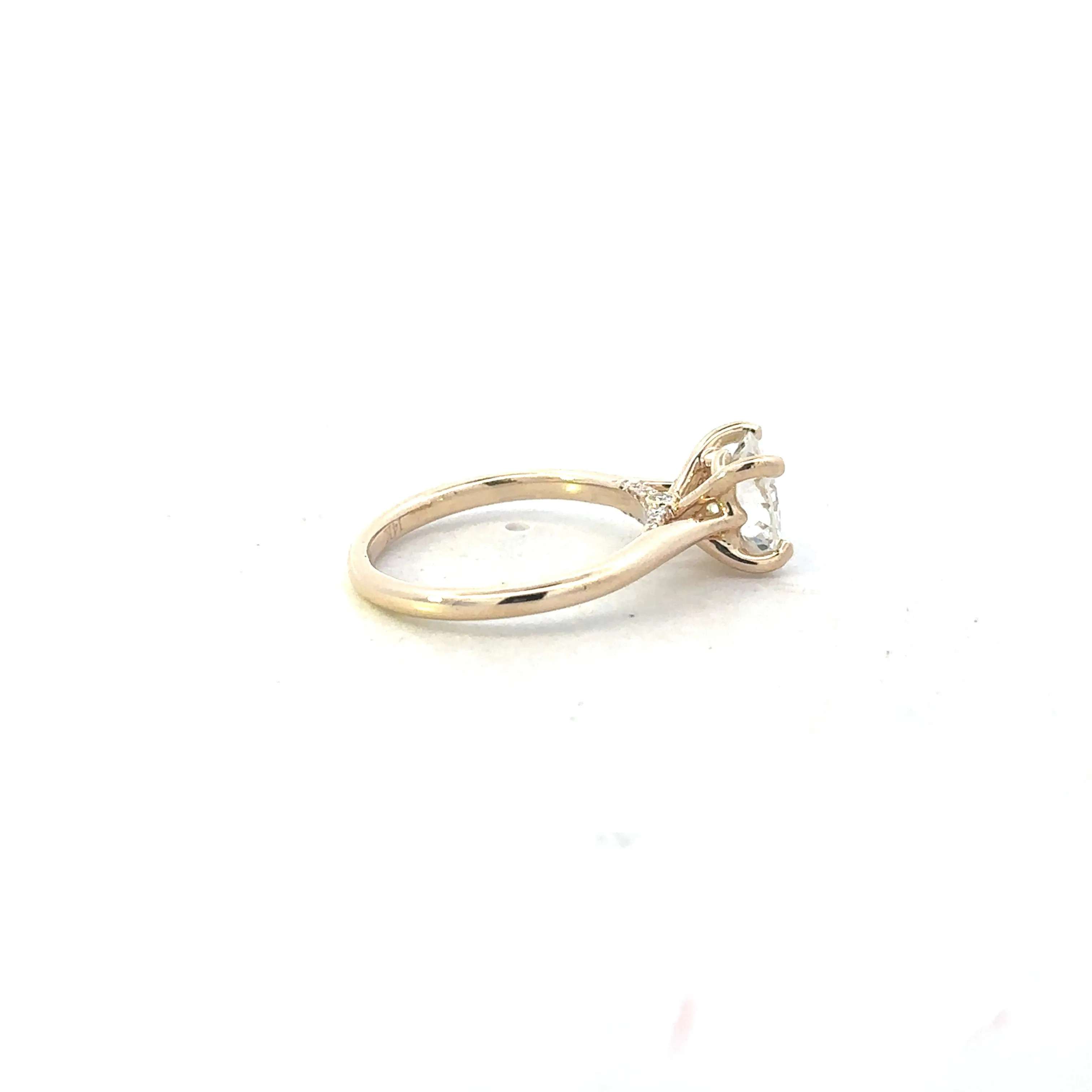 Round Cut Solitaire With Decorated Bridge