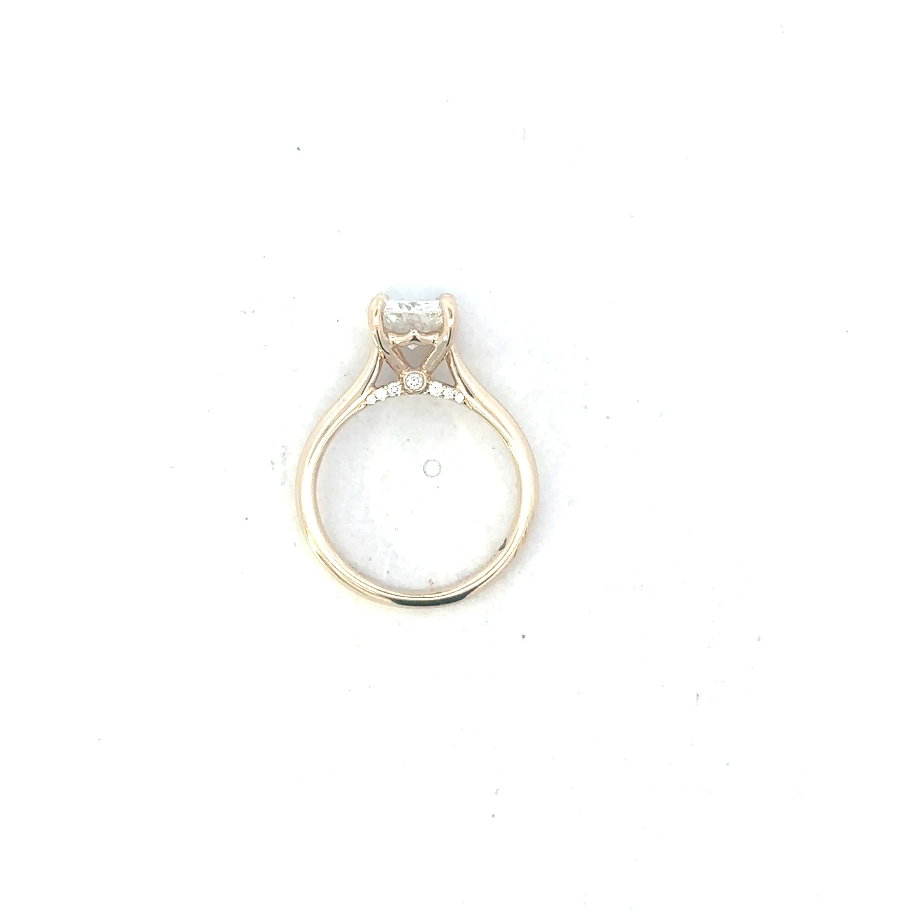 Round Cut Solitaire With Decorated Bridge
