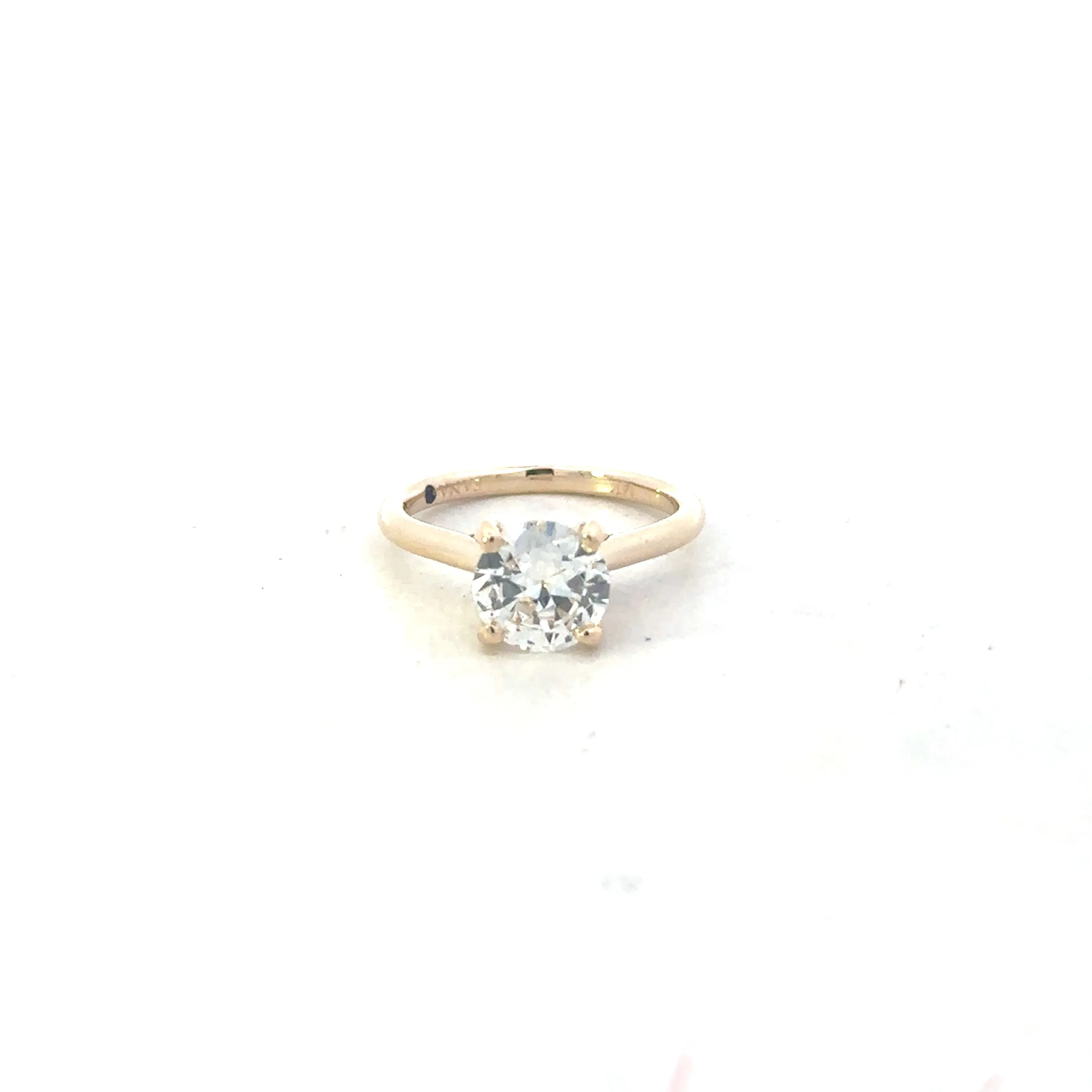 Round Cut Solitaire With Decorated Bridge
