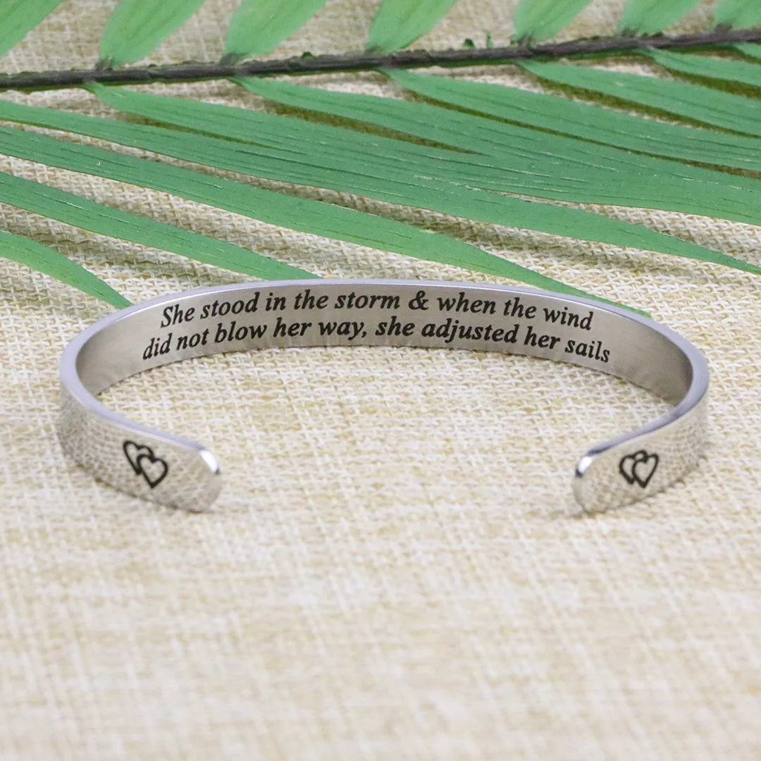 She Stood in the Storm Wide Hidden Message Cuff Bracelets