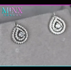 Womens Diamond Ear Studs | Pear cut diamond ear studs